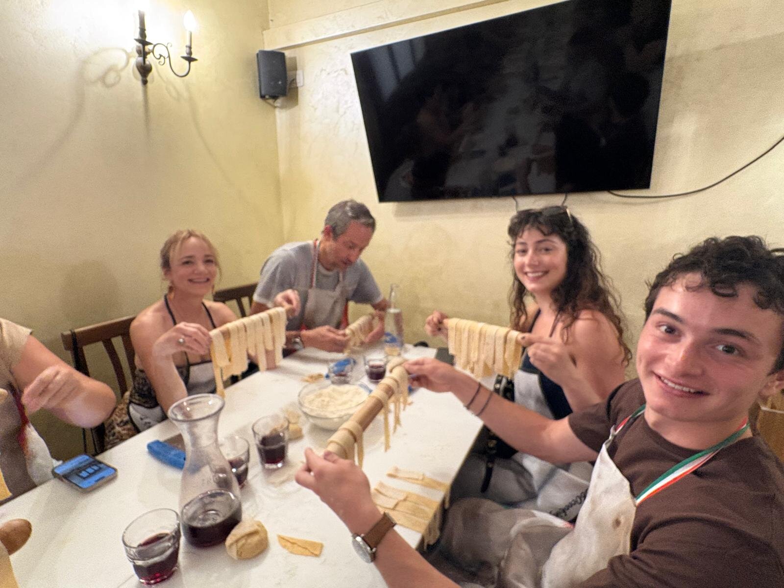 Luke making fresh pasta with his family